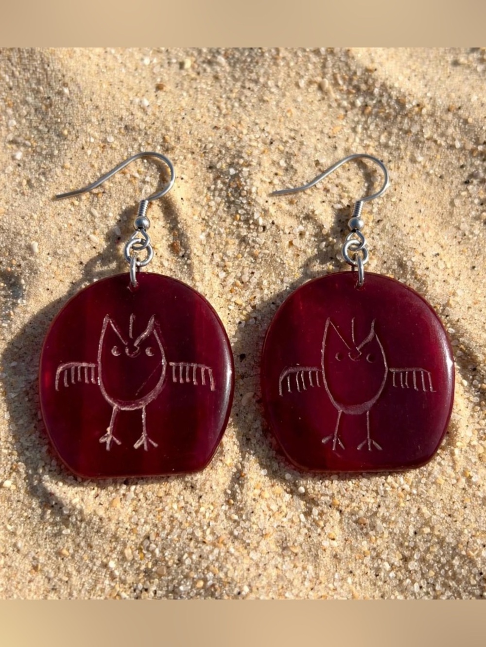 Hand-carved owl petroglyph earrings in genuine buffalo horn.